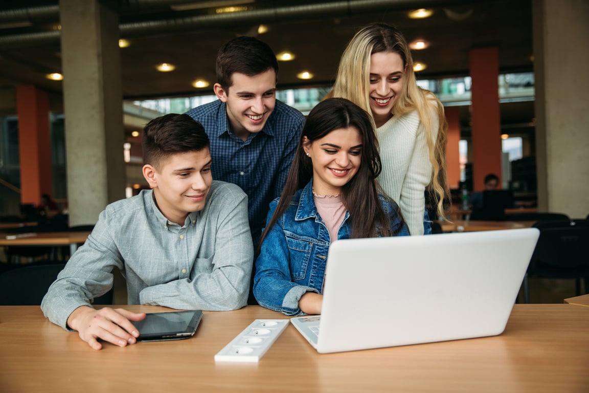 Group of College Students Studying at the Library 